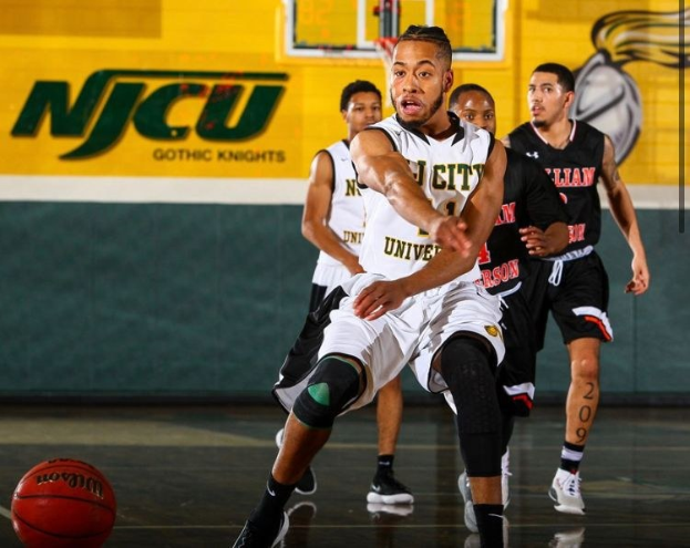 A group of men playing basketball on a court with a wall displaying "NCU Men's Basketball" and the date February 22nd, 2020, along with a basketball net.