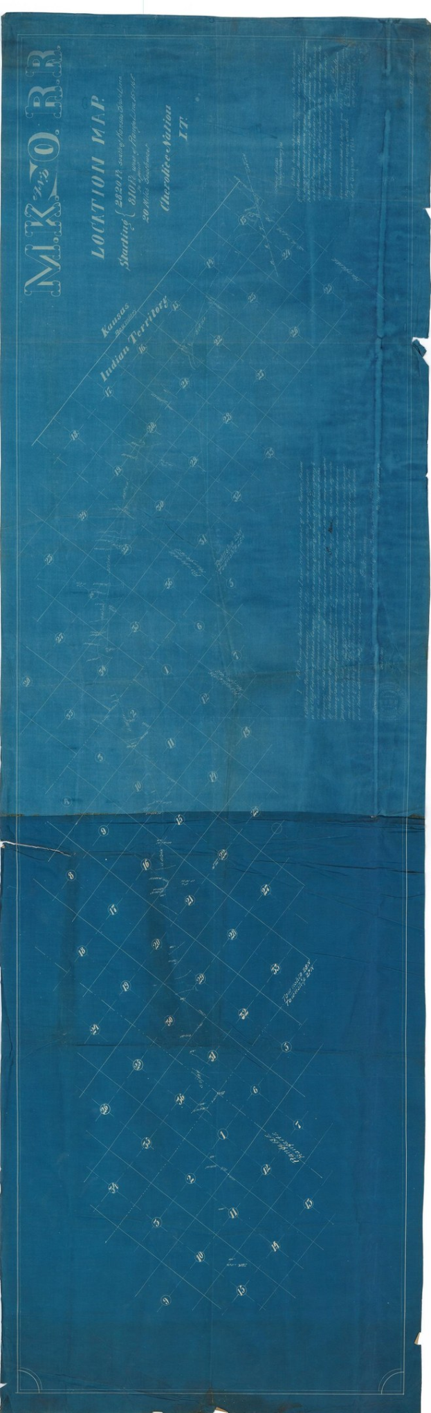 A blue sheet of paper displaying a detailed map of the Indian Territory, including geographical features like mountains, rivers, and cities, with accompanying text about the territory and its inhabitants.