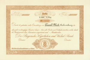 Alter Aktienchein mit goldenem Rand, der ein Portr├Ąt eines Mannes und Text zeigt, wahrscheinlich eine Anleihe.