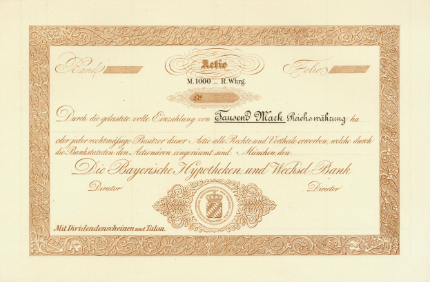 Alter Aktienchein mit goldenem Rand, der ein Portr├Ąt eines Mannes und Text zeigt, wahrscheinlich eine Anleihe.