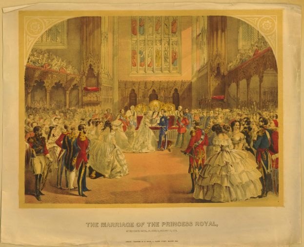 A group of people standing in front of a wall with framed photos, with text at the bottom reading "The Marriage of The Princess Royal".