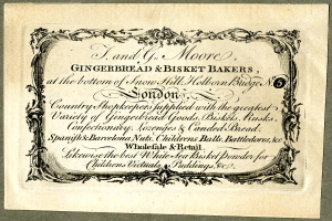 Eine alte Visitenkarte mit einer Illustration eines Lebkuchen- und Keksbäckers, auf der die Angebote der Bäckerei beschrieben sind.