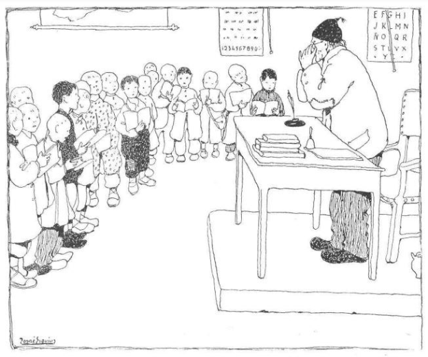 Mann in Schuhen sitzt an einem Schreibtisch mit Büchern und Gegenständen, gegenüber einer Gruppe von Kindern, mit Papieren an der Wand dahinter.