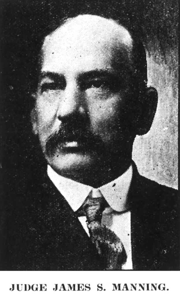 Black and white portrait of Judge James S. Manning in a suit and tie with text at the bottom reading "Judge James S Manning".
