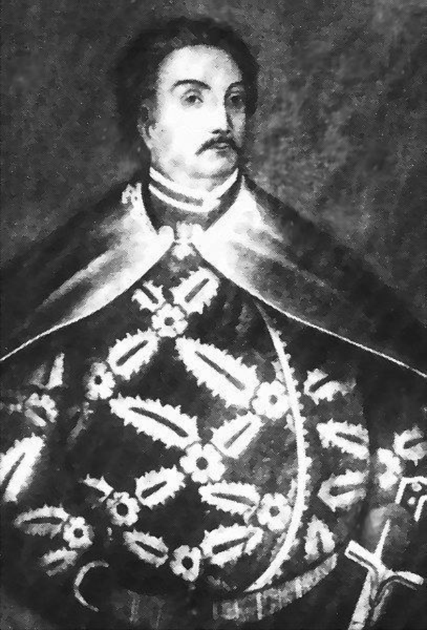 Schwarzes und weißes Foto von Papst Johannes Paul II. in Priesterroben, der eine schwarze Robe mit weißem Kragen und Manschetten trägt und seine Hände verschränkt.