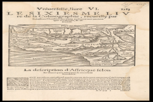Old book with a detailed map of Africa on its cover, including geographical features and text, set against a black background.