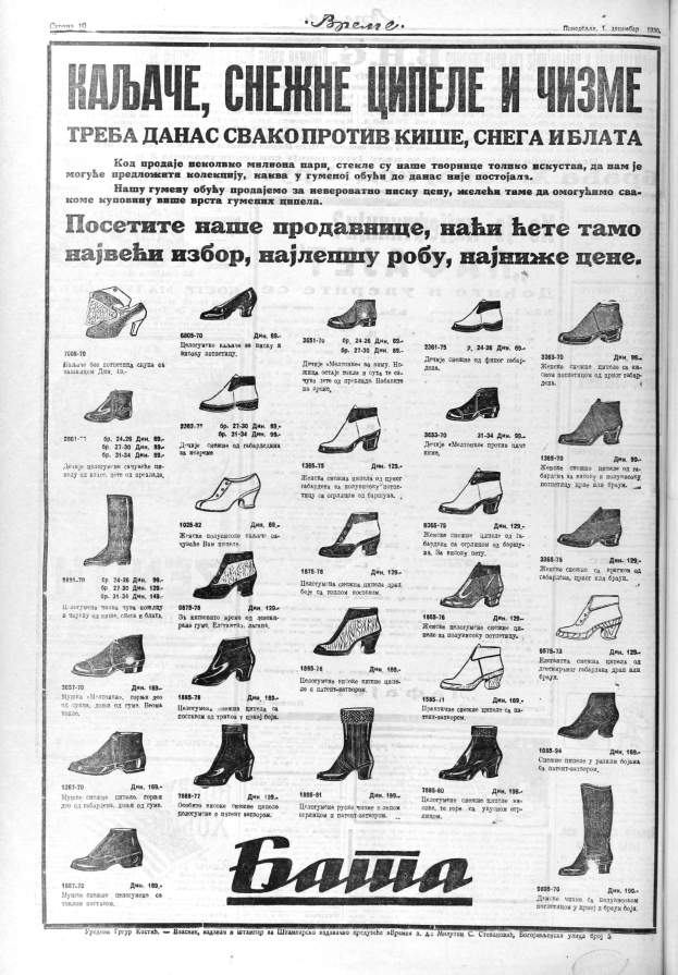 A collection of shoes arranged in a neat row on top of an old book with visible text on its pages.