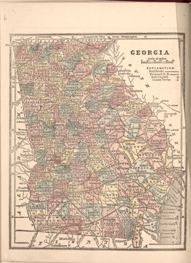 Old book with a detailed map of Georgia, including counties and cities, and accompanying text.
