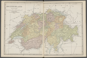 Offenes Buch mit detaillierter Landkarte der Schweiz mit Provinzen und Städten, begleitet von erklärendem Text.