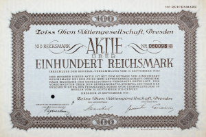 Old German stock certificate for 100 Reichmarks with black border and printed text.
