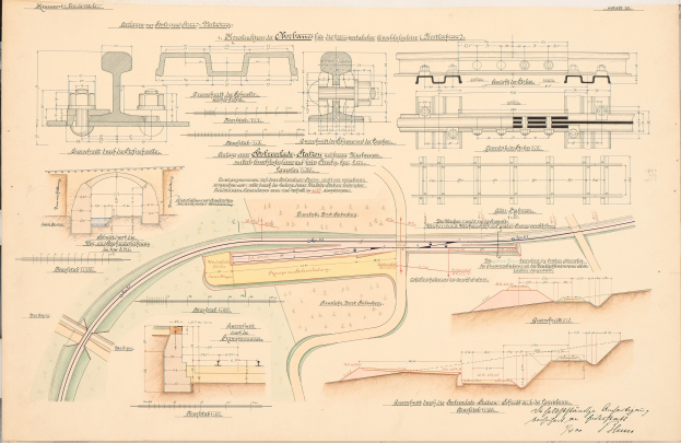 Ein altes Buch mit detaillierten Zeichnungen und Text, darunter eine Eisenbahnschienen-Illustration, das eine umfassende Eisenbahnanlage zeigt.