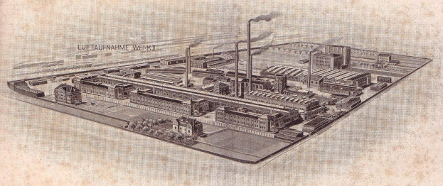 Aerial drawing of a German city with varied buildings, green trees, and chimneys emitting smoke, labeled "Luftaufnahme Werkt, Germany."