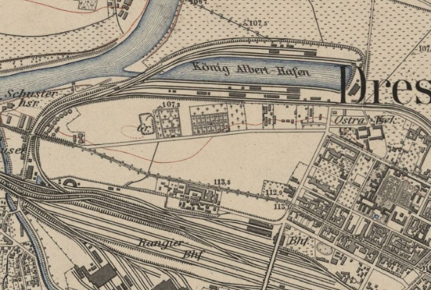 Ein altes Stadtplan von Dresden, Deutschland, mit einem Fluss, Gebäuden, Straßen und Text, das einen detaillierten Überblick über die Stadt bietet.